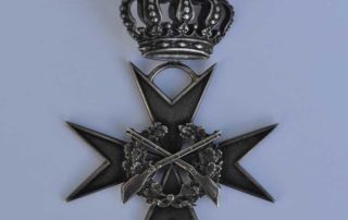 Awers orderu króla strzelców.